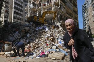epaselect epa12877036 A woman walks next to a destroyed residential building the day after an Israeli airstrike in the Ain Mreisseh neighborhood of Beirut, Lebanon, 09 April 2026. At least 182 people were killed and more than 890 others injured after Israeli airstrikes hit multiple locations across Lebanon on 08 April, the Lebanese Ministry of Health reported. Israel launched a large-scale attack across Lebanon, including central Beirut, a day after the US and Iran agreed to a ceasefire. The Israeli government said the ceasefire does not cover Lebanon and that strikes on Hezbollah locations will continue.  EPA/WAEL HAMZEH
